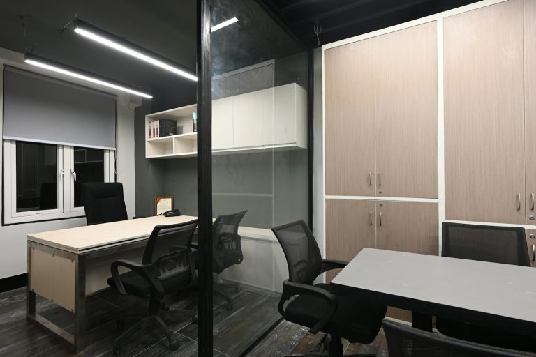 a room with a table and chairs