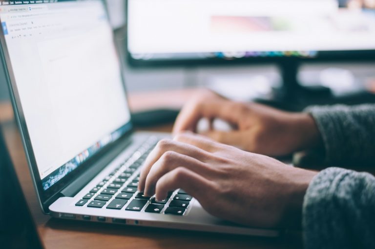 Postmortems: What We Learned When CSPM tools Were Missing person using MacBook Pro