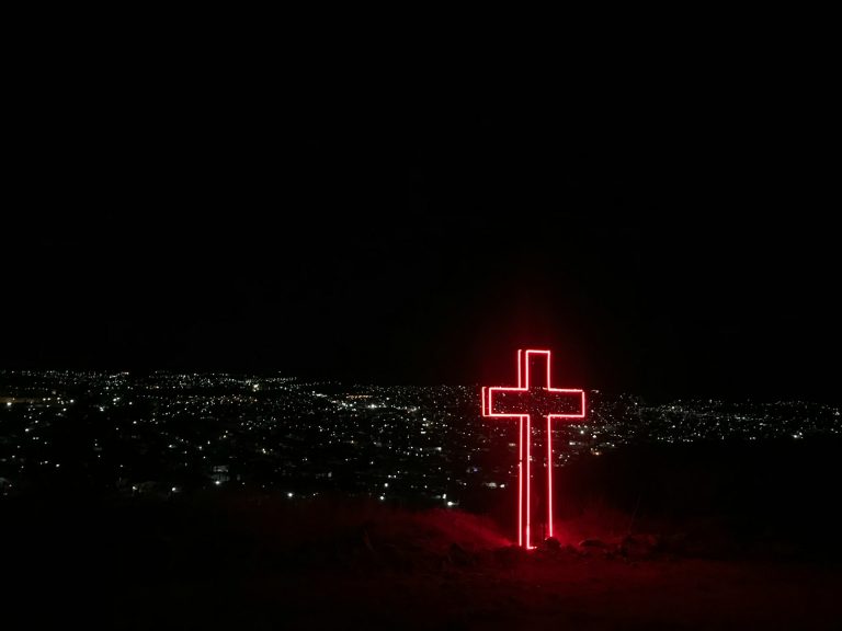 red neon light cross signage